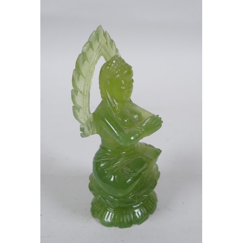 296 - An oriental carved green jade Buddha, 10cm high