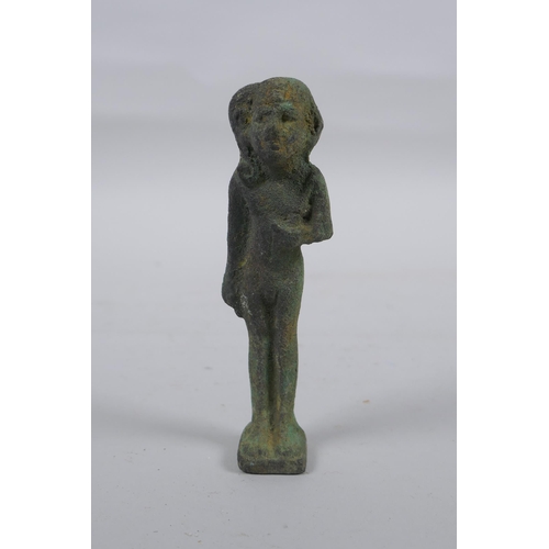 297 - An Egyptian bronze figure, 11cm high