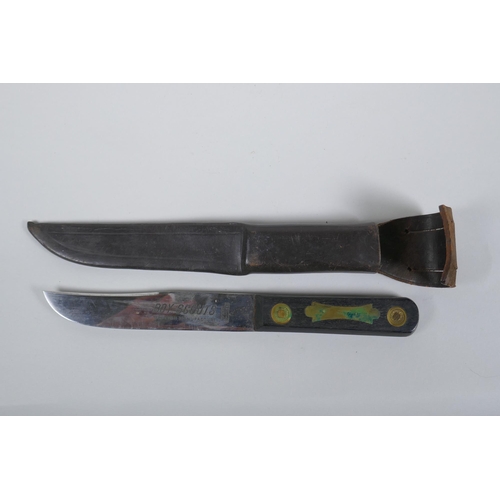 30 - A WWII US made machete by Legitimus Collins & Co, model no. 1250, and a British made Boy Scout's... 