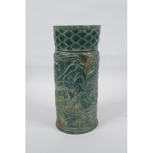 303 - A Chinese spinach green glass brush pot decorated with a landscape scene, seal mark to base, 25cm hi... 