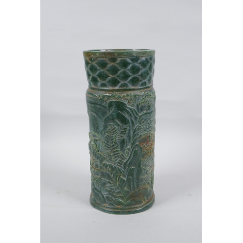 303 - A Chinese spinach green glass brush pot decorated with a landscape scene, seal mark to base, 25cm hi... 