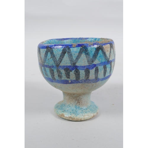 307 - A faience glazed stoneware goblet, 9cm high