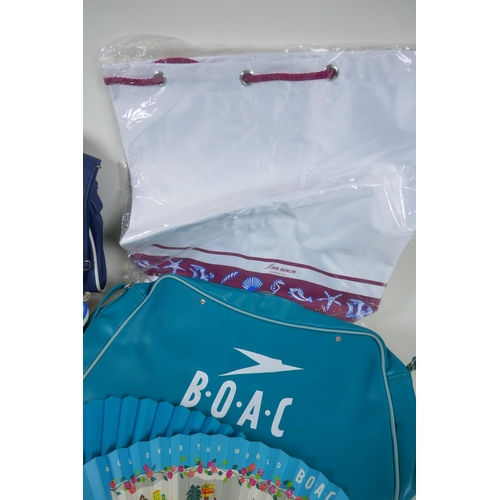 318 - A collection of vintage flight bags including BOAC, UniGlobe, Air Berlin etc, a complete flight vani... 