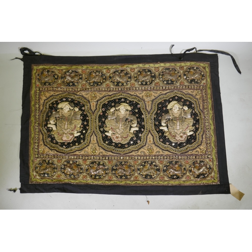 32 - An antique Burmese stump work wall hanging depicting dancers and tigers, 172 x 120cm