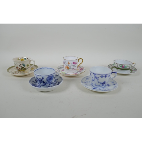 330 - Five porcelain cups and saucers in various patterns, including Meissen Onion Pattern, Royal Copenhag... 