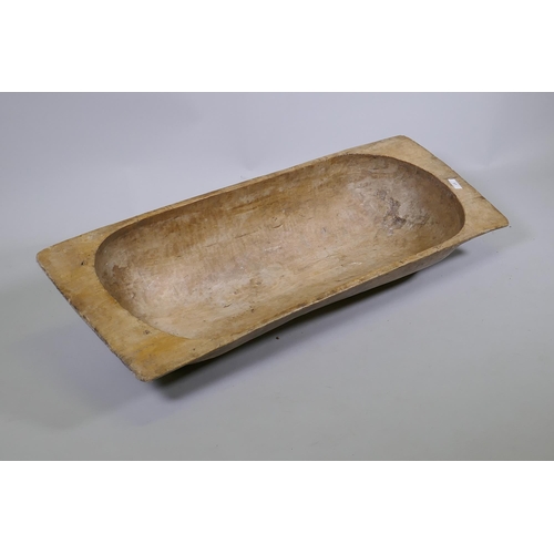 37 - A large antique rustic pine dough trough, 111 x 40cm