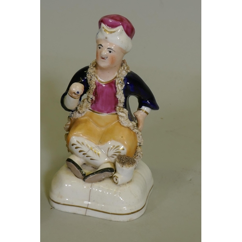 39 - A C19th Staffordshire temperance double sided figure of a Gin and Water drinker, 22cm high, and anot... 