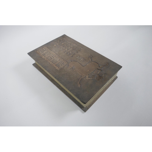 40 - A Chinese wood and silk bound book containing white jade tablet pages with chased and gilt inscripti... 