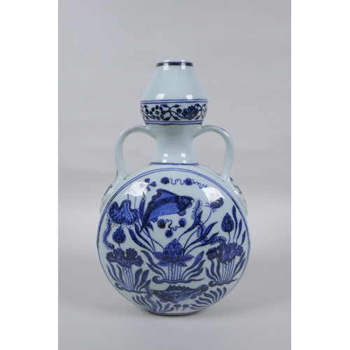 42 - A blue and white porcelain two handled garlic head shaped flask decoration with carp in a lotus pond... 