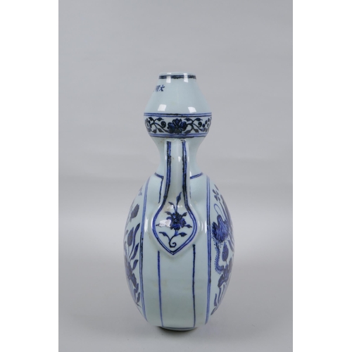 42 - A blue and white porcelain two handled garlic head shaped flask decoration with carp in a lotus pond... 