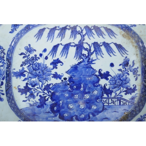 48 - A late C19th/early C20th Chinese blue and white export ware porcelain meat dish decorated with a gar... 