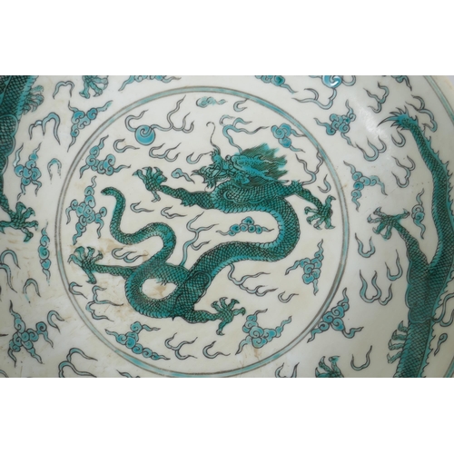 50 - A porcelain dish with green enamel dragon decoration, Chinese YongZheng 6 character mark to base, 21... 