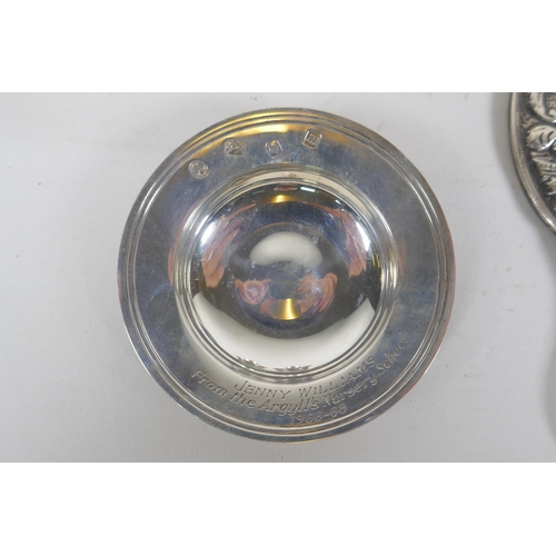 601 - A quantity of hallmarked silver to include a pair of sifters with glass liners, a trinket dish by R.... 