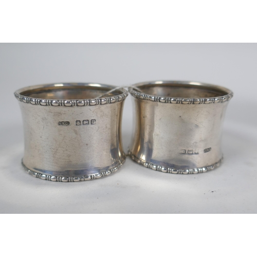 601 - A quantity of hallmarked silver to include a pair of sifters with glass liners, a trinket dish by R.... 