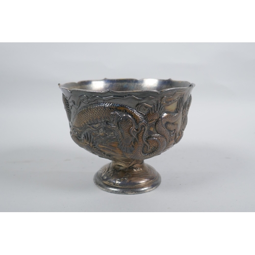 602 - An antique Japanese antimony stem bowl with raised dragon decoration, indistinct mark to base, 12cm ... 