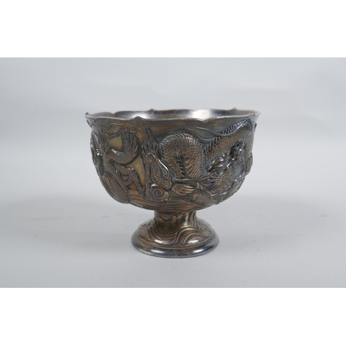 602 - An antique Japanese antimony stem bowl with raised dragon decoration, indistinct mark to base, 12cm ... 