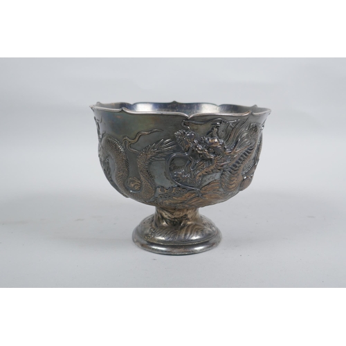 602 - An antique Japanese antimony stem bowl with raised dragon decoration, indistinct mark to base, 12cm ... 