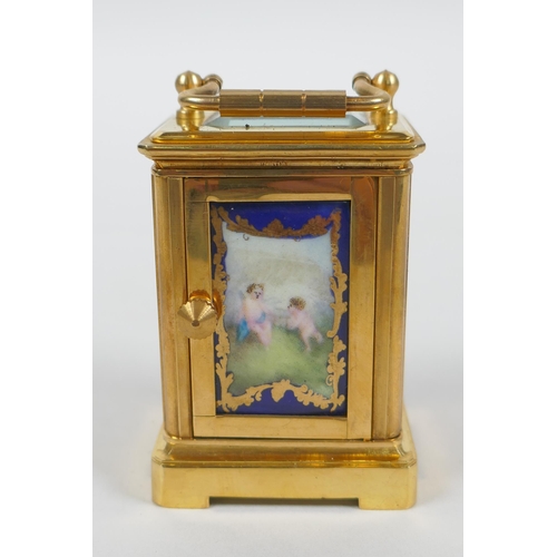 610 - A miniature brass cased carriage clock with Sevres style porcelain panels, 6cm high