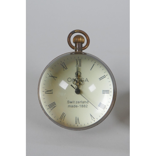 624 - A brass and glass ball desk clock and a Stanley style brass sundial clock and compass, 6cm diameter