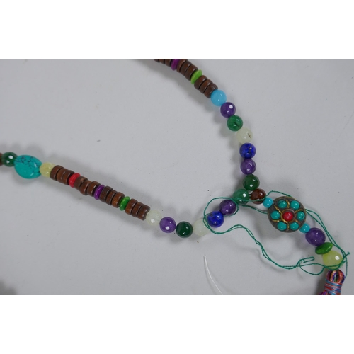 630 - Six assorted strings of Tibetan Mala beads including turquoise, bone, nut, stone etc