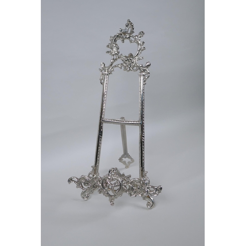 635 - A silvered metal easel, 40cm high