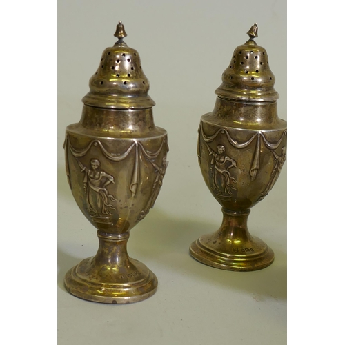 640 - A pair of silver pepper pots, Sheffield 1901, Thomas Bradbury & Sons Ltd, and a mustard pot, She... 