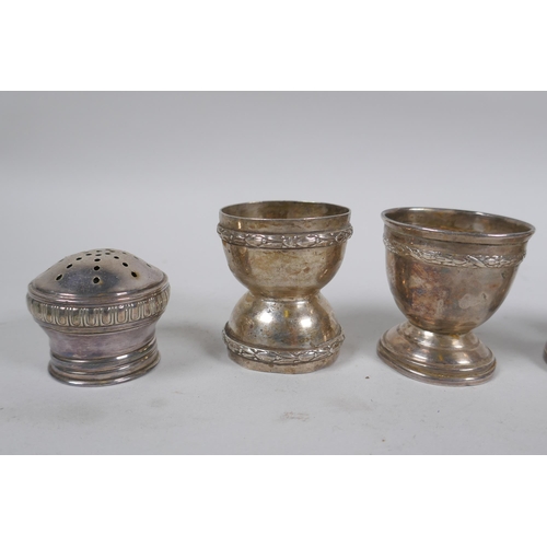 651 - Four C19th French silver egg cups and shaker top, 132g