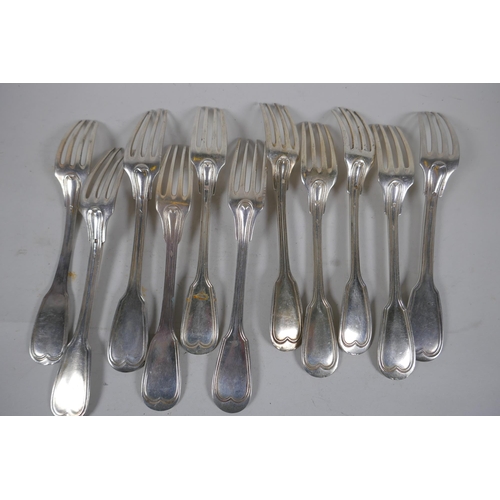 656 - A matched set of eleven C18th French silver fiddle and thread pattern forks, 854g