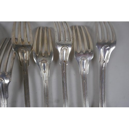 656 - A matched set of eleven C18th French silver fiddle and thread pattern forks, 854g