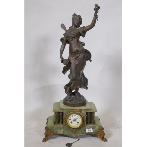 669 - A French alabaster mantel clock with bronzed spelter figure, 'Madulate', after Moreau, the movement ... 