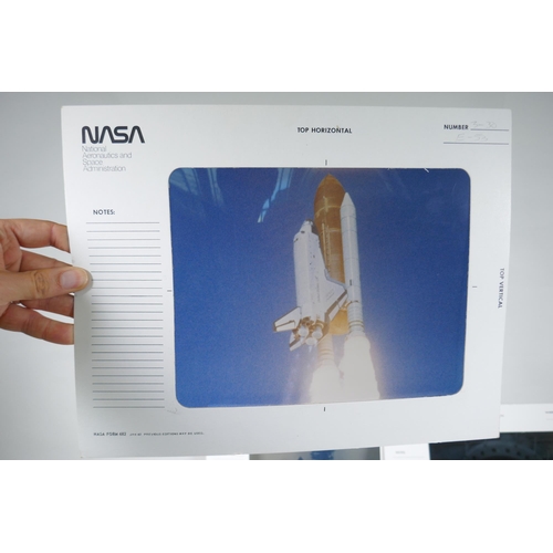 69 - A quantity of NASA related collectables to include transparencies, informational cards, booklets, st... 