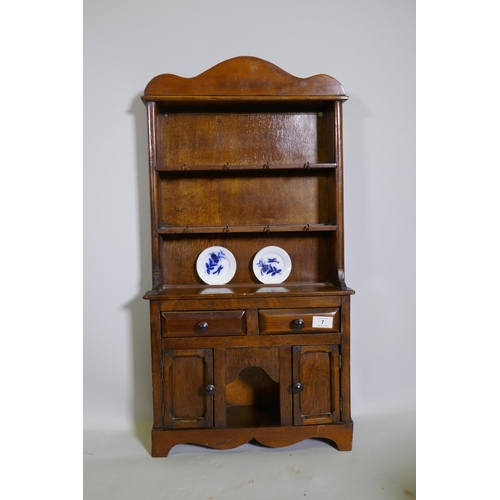 7 - A mid century miniature model of an oak dresser, 40 x 12 x 76cm