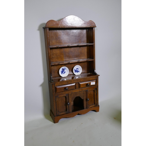 7 - A mid century miniature model of an oak dresser, 40 x 12 x 76cm