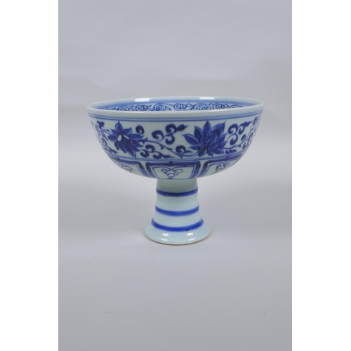 70 - A Chinese blue and white porcelain stem bowl with dragon and lotus flower decoration, 12cm high x 16... 