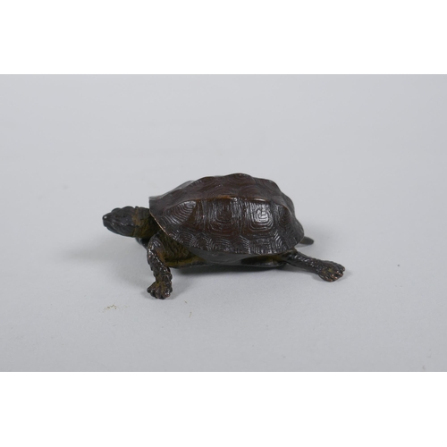 71 - A Japanese Jizai style bronze okimono tortoise with an articulated head and tail, 5cm long