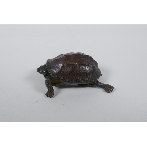 71 - A Japanese Jizai style bronze okimono tortoise with an articulated head and tail, 5cm long