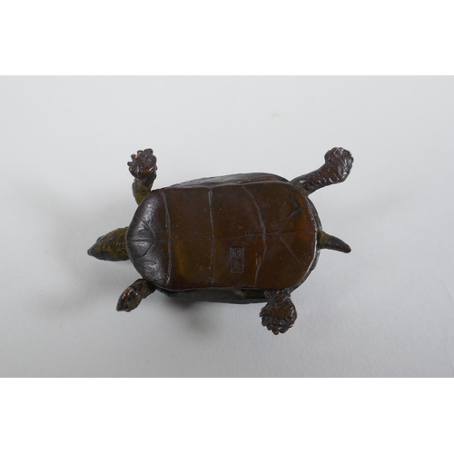 71 - A Japanese Jizai style bronze okimono tortoise with an articulated head and tail, 5cm long