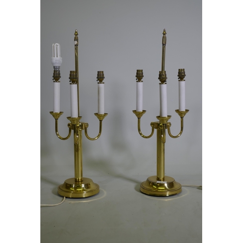 72 - A pair of three branch brass table lamps, 63cm high