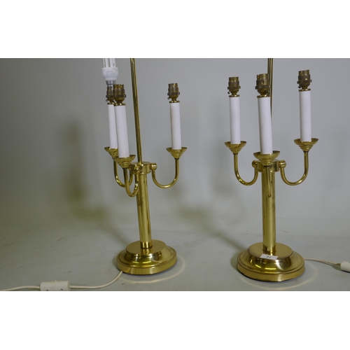 72 - A pair of three branch brass table lamps, 63cm high