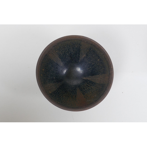 77 - A Chinese Jian Kiln tea bowl with hares fur glaze, and another with a treacle glaze, 9cm diameter