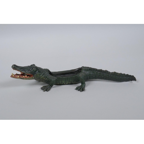 79 - After Bergmann, a cold painted bronze in tray in the form of a crocodile, 22cm long