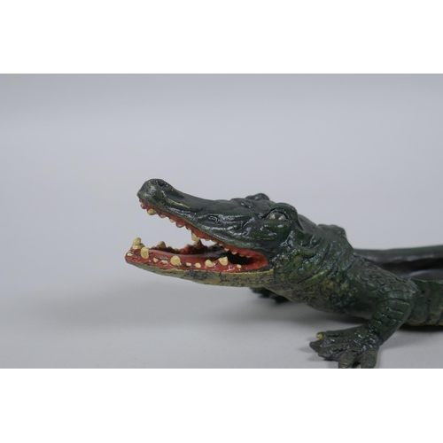 79 - After Bergmann, a cold painted bronze in tray in the form of a crocodile, 22cm long