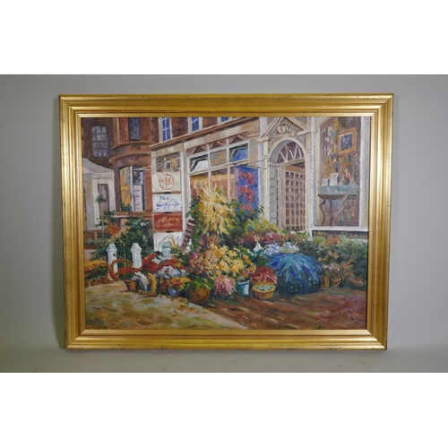 813 - Street scene with flower shop, signed Parker, late C20th, oil on canvas, 102 x 76cm