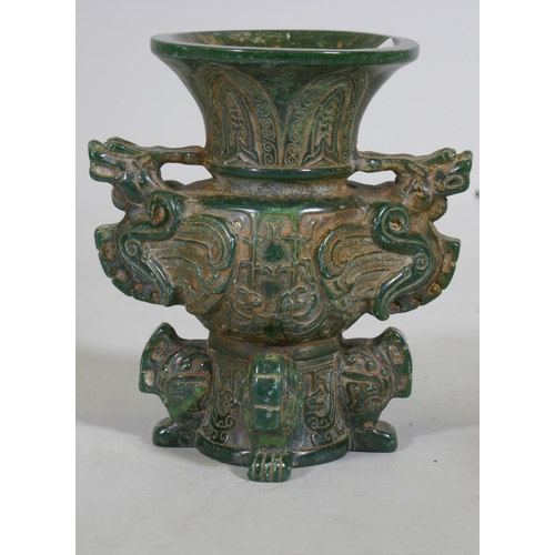 89 - A Chinese green hardstone vase with dragon decoration, 19cm high