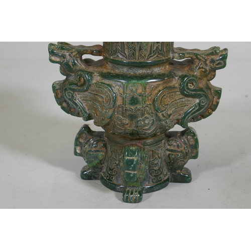 89 - A Chinese green hardstone vase with dragon decoration, 19cm high