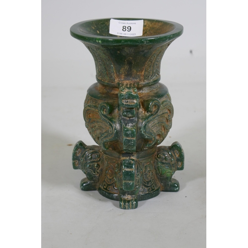 89 - A Chinese green hardstone vase with dragon decoration, 19cm high