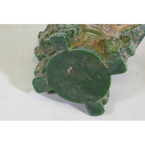 89 - A Chinese green hardstone vase with dragon decoration, 19cm high