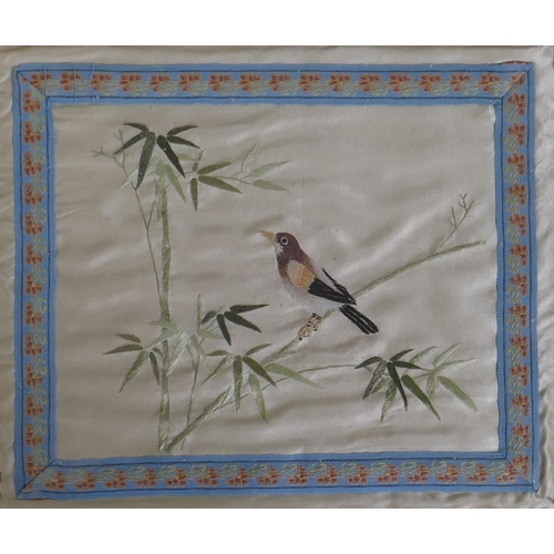 92 - A Chinese embroidery on silk, bird on a bamboo branch, 28 x 23cm