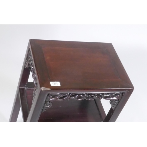 1096 - An antique Chinese hardwood two tier side table with carved and pierced frieze, 41 x 30cm, 67cm high