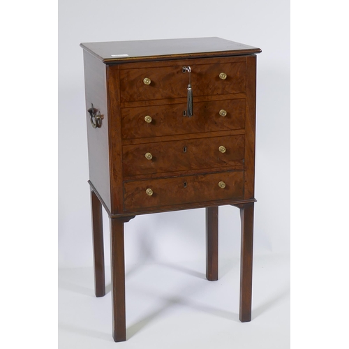 1144 - A George III mahogany cellarette, with four false drawers and lift up top revealing a sectioned inte... 